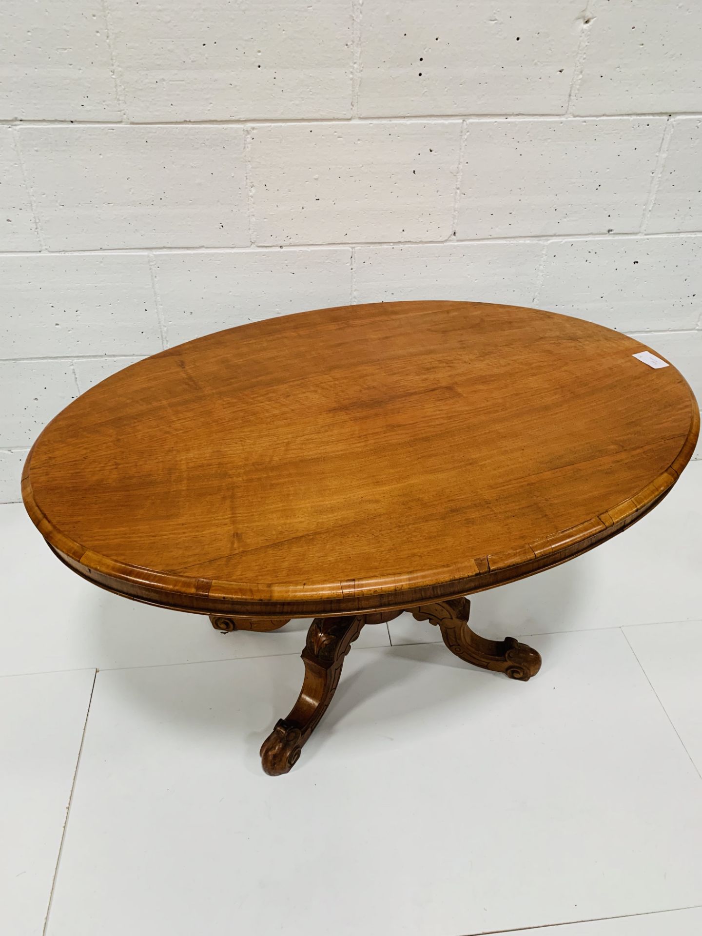 Mahogany oval tilt top table on carved pedestal to four feet. - Image 3 of 3