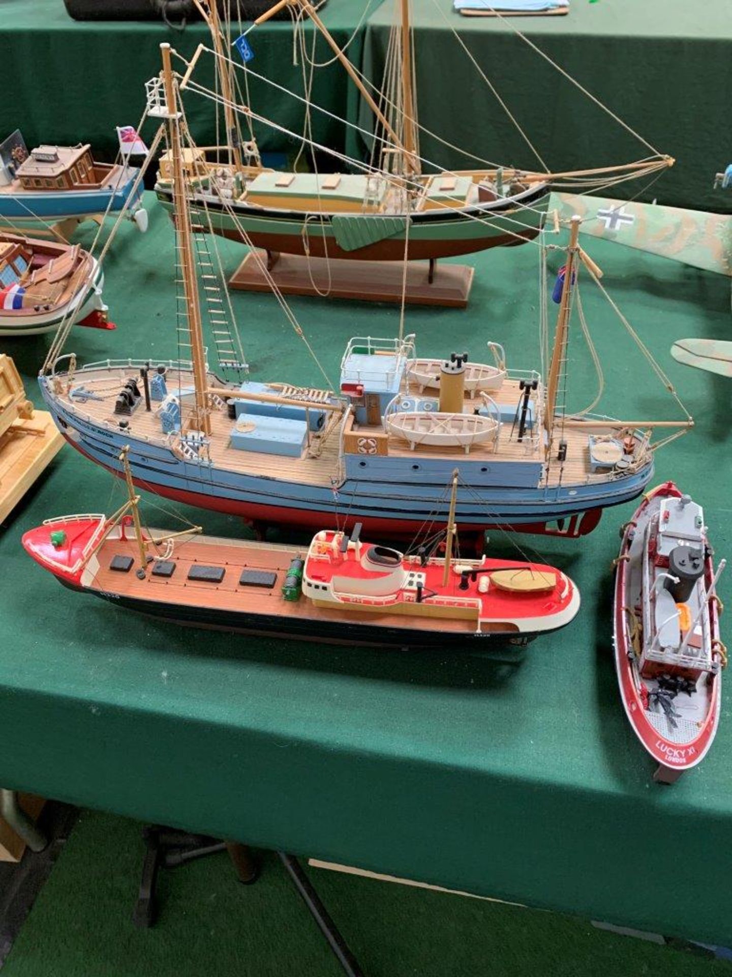 Three model boats.