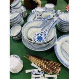 A quantity of blue and white Chinese dinnerware.
