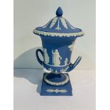 Wedgwood blue jasper covered urn and a white and gold decorated epergne.