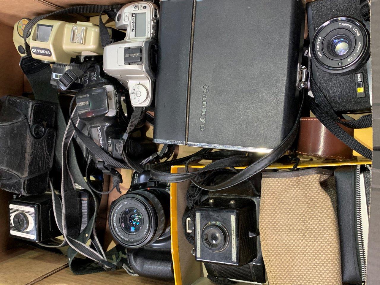 Collection of 11 Vintage cameras, filters, and leather lens case