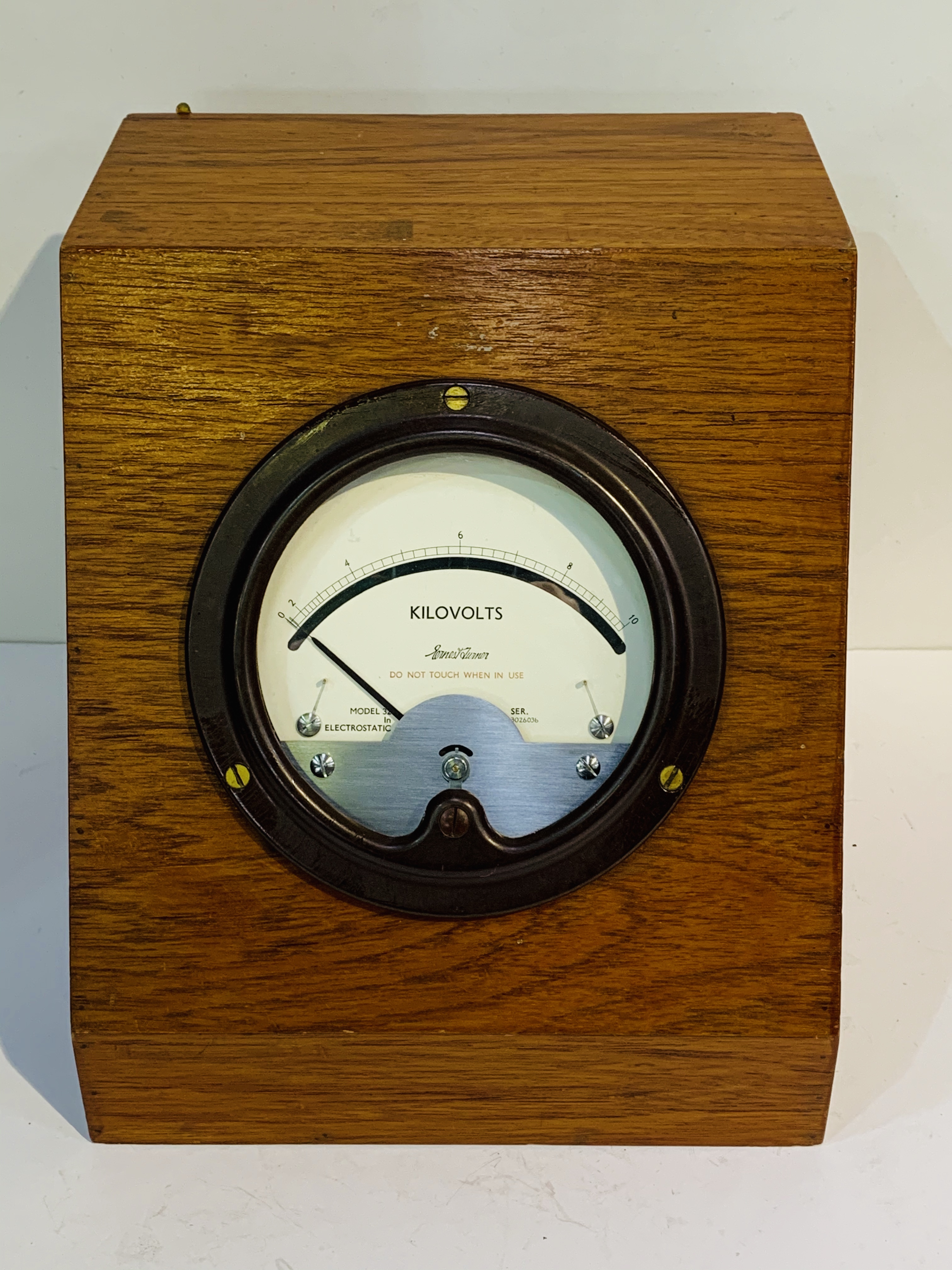 Early 20th century Ernest Turner Electrostatic Voltmeter, in canted display case