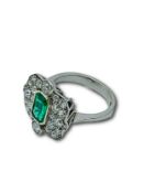 18ct white gold ring set with an emerald and diamonds.