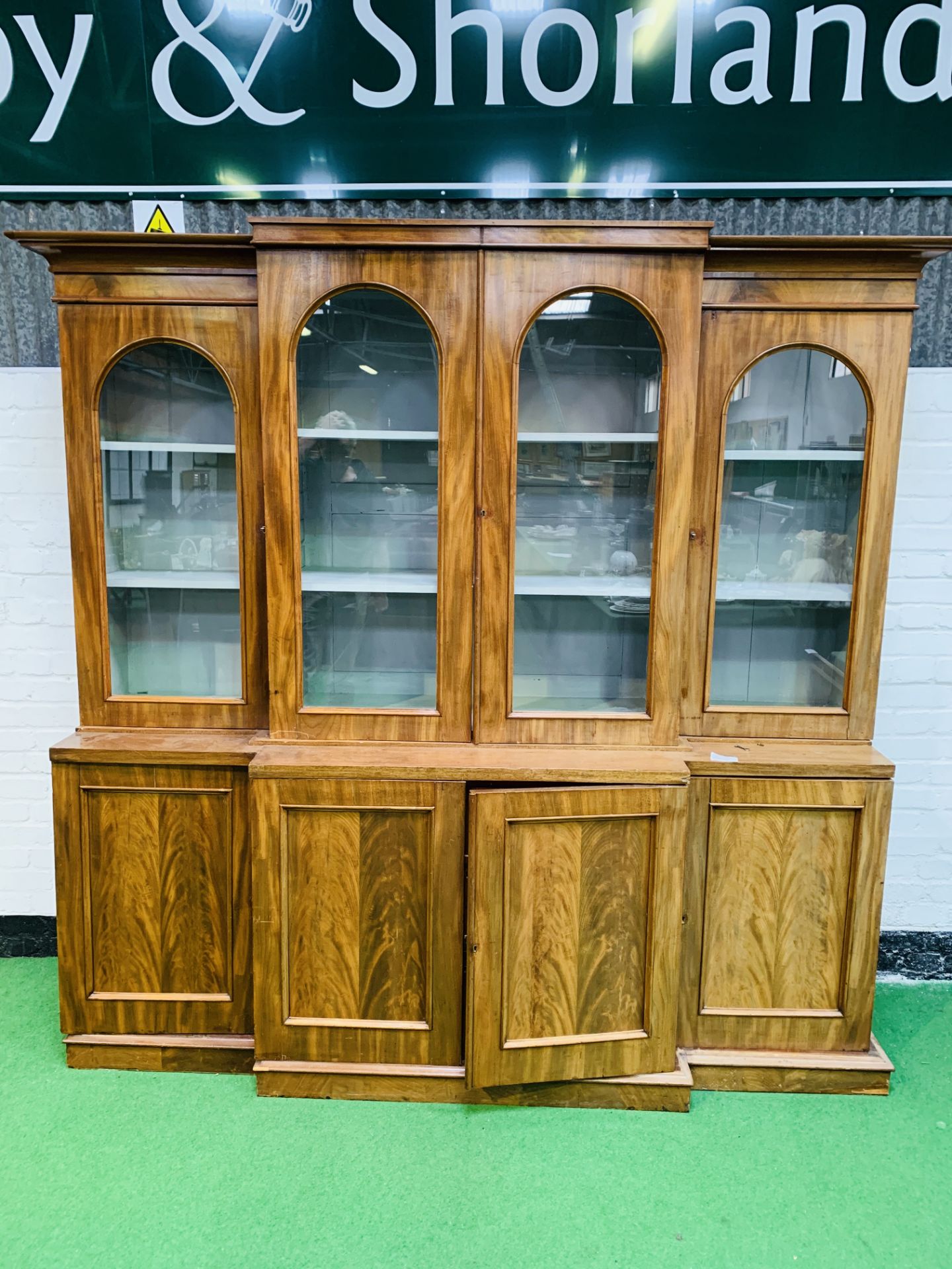 Mahogany breakfront bookcase.