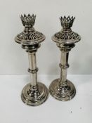 A metal travel case containing a pair of white metal campaign candle lamps by Sherwood Ltd