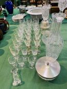 Quantity of vintage glassware including glasses, vases, decanters and cut crystal items.