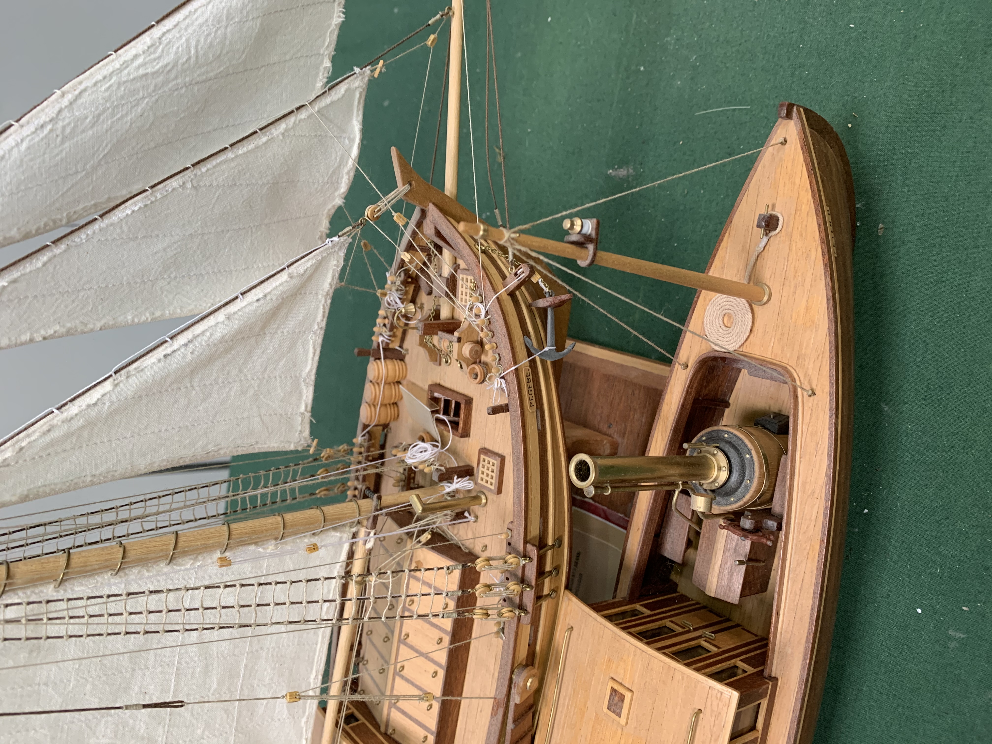 A model of a sailing ship "Pegebe", and a model steam launch.