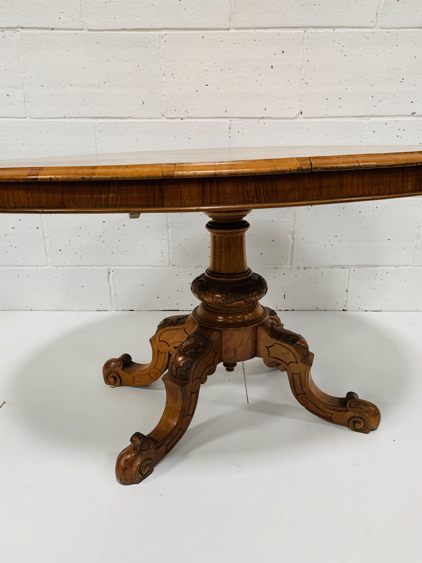 Mahogany oval tilt top table on carved pedestal to four feet. - Image 2 of 3