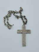 Large ornate Victorian silver pendant cross. Decorated with scrolls and climbing vines. Weight 50gms