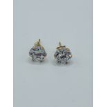Pair of 9ct gold and zurconia earrings.