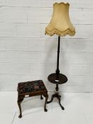 Mahogany stool together with a mahogany lamp standard.