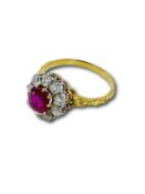 Burma ruby and diamond cluster ring.