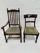 Oak framed open armchair together with a dining chair.