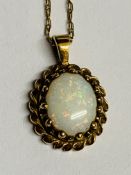 9k gold opal necklace.