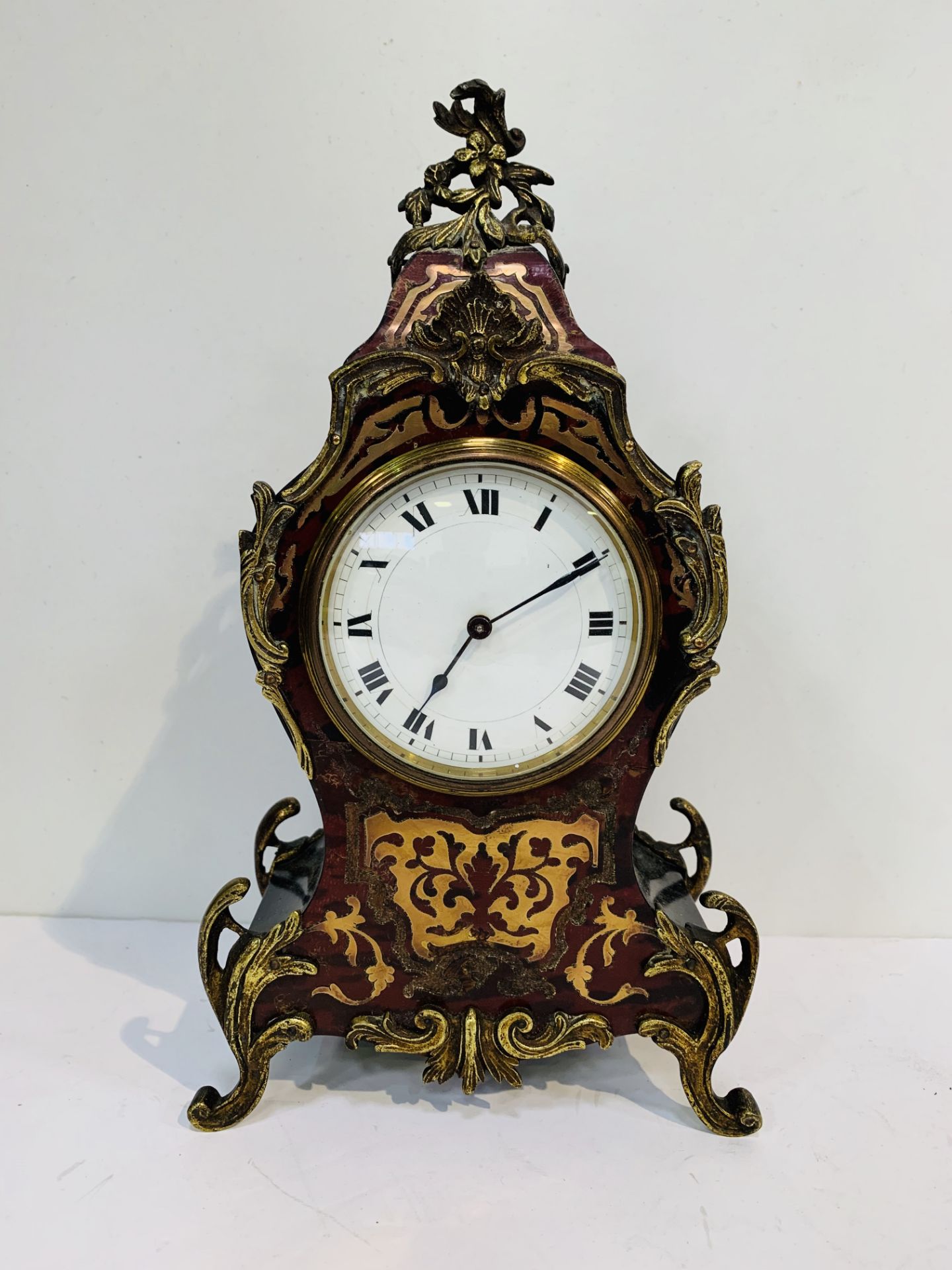 Circa 1900 Rococo style faux tortoiseshell and boullework mantel clock. A/F.