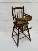 Antique metamorphic highchair.