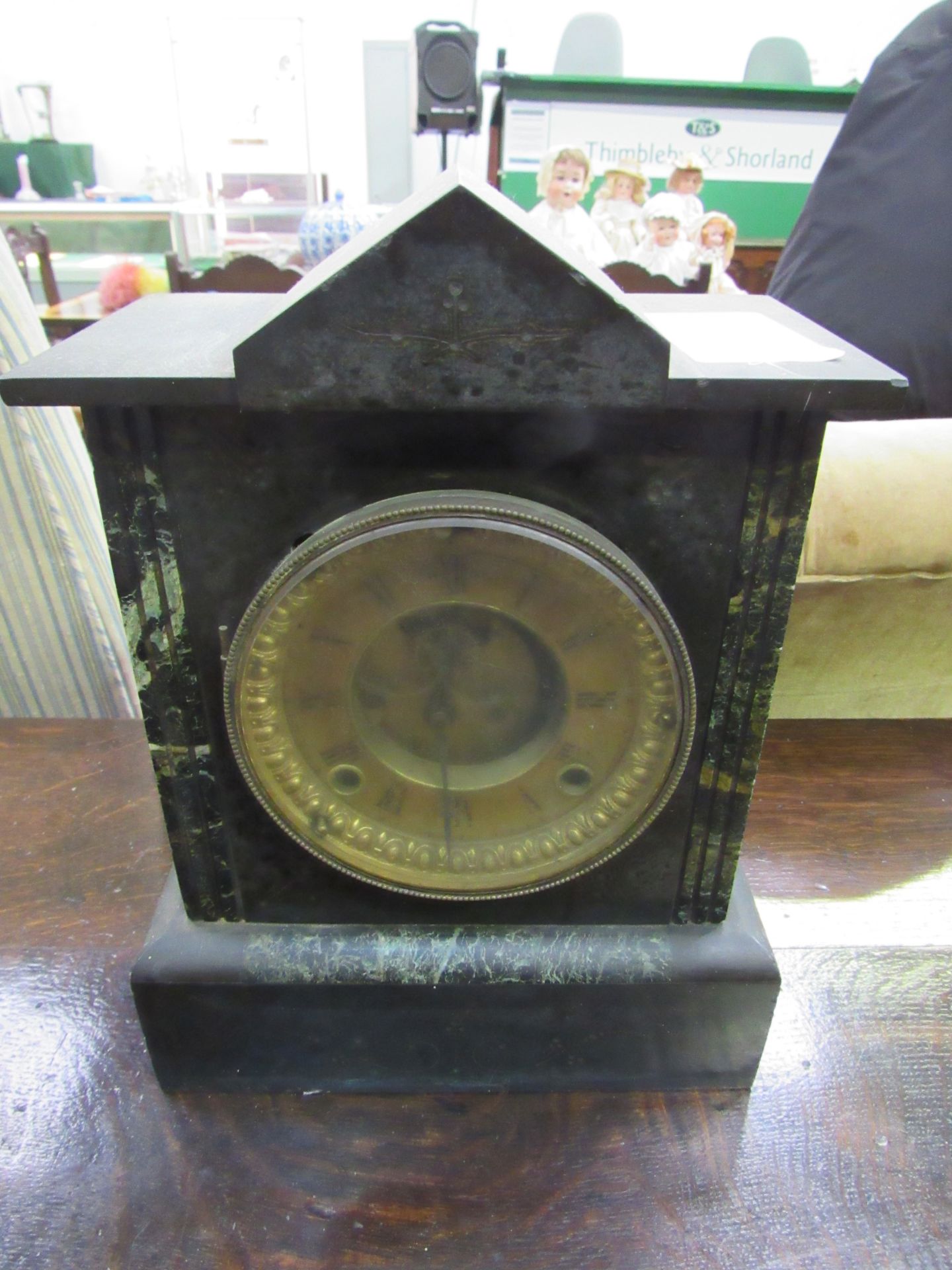 Slate and marble cased mantel clock by Ansonia Clock Co.