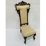 Gold upholstered carved mahogany framed prie dieu 35 x 53 x 109cms.