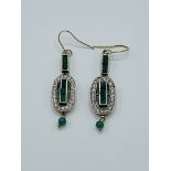 Art deco style yellow and white metal, emerald and diamond drop earrings.