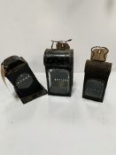 Three paraffin hand lamps.