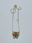 18ct gold Butterfly pendant with enamel inlay and fixed chain. 4.4gm.