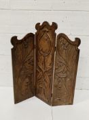 Carved oak three fold screen.