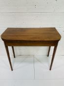 Late 19th century inlaid light walnut fold-over card table with boxwood stringing