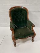 Victorian walnut framed upholstered armchair.