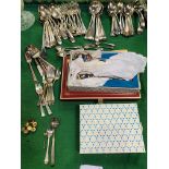 A quantity of silver plated flatware plus 3 small silver items.
