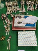 A quantity of silver plated flatware plus 3 small silver items.