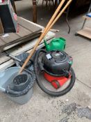 Henry hoover, together with mops and buckets.