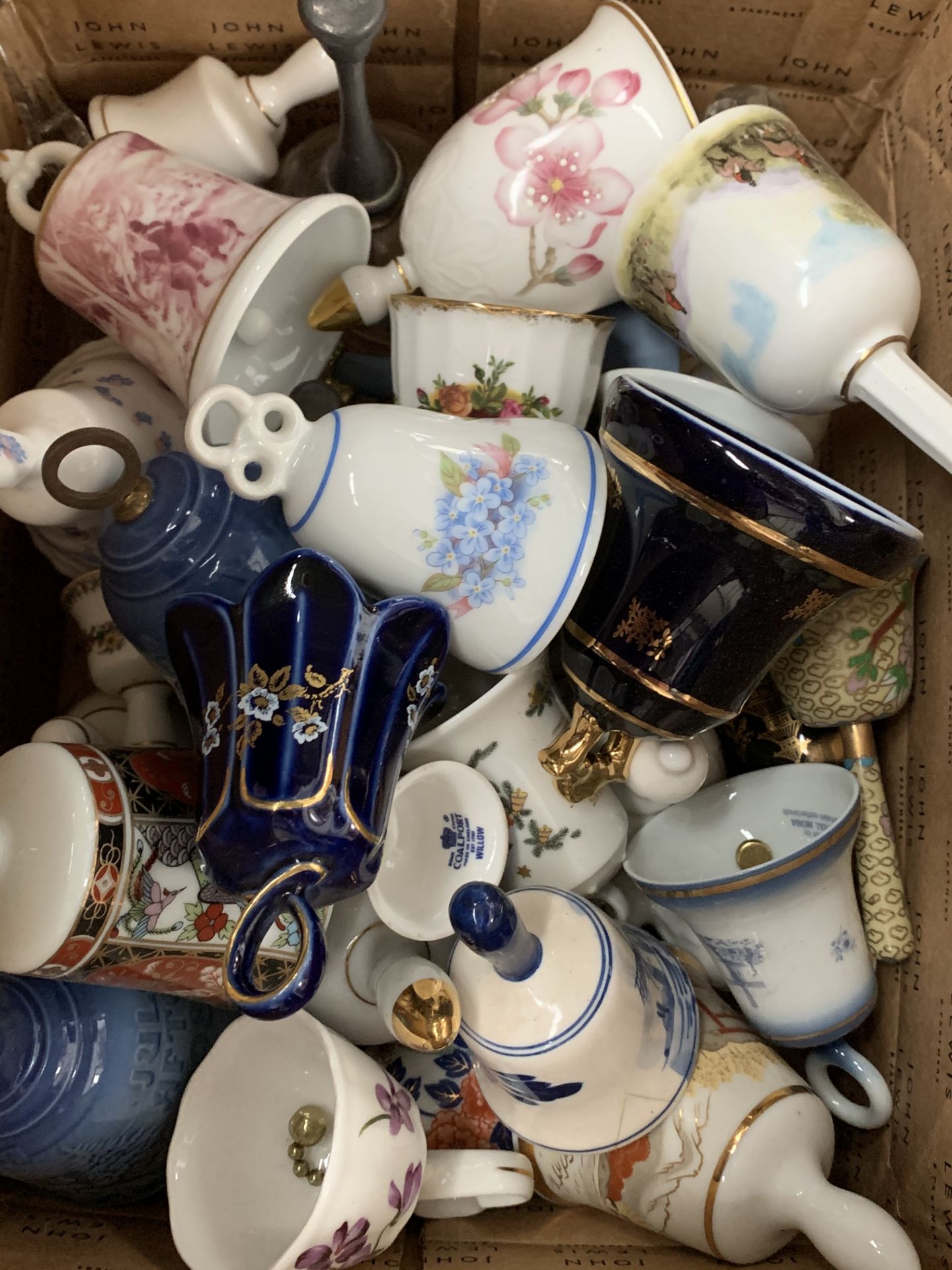 Chinese wall mounted display cabinet with key, together with a collection of ceramic bells. - Image 2 of 2