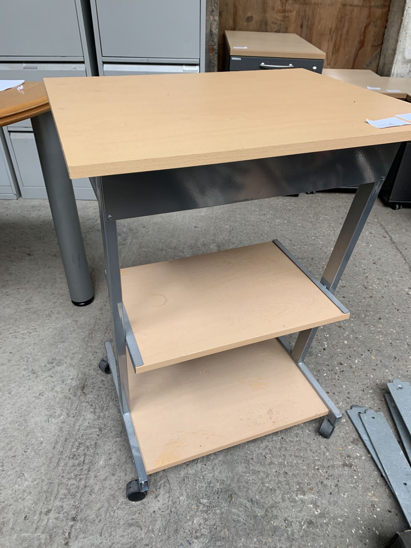 Computer table on casters with 2 undershelves, 60 x 50 x 80cms.