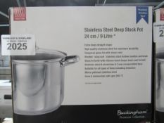 Stainless steel deep stock pot with lid.