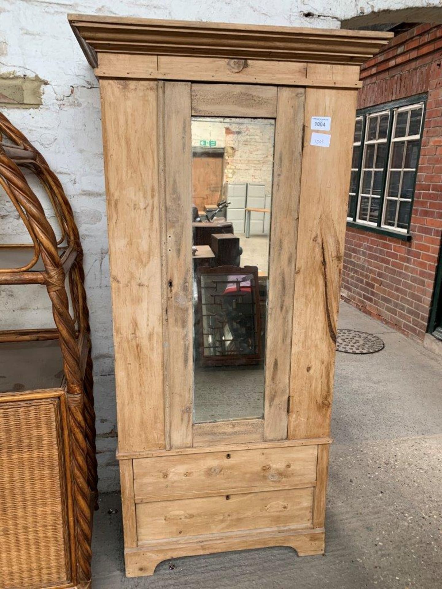 Pine single wardrobe with mirror door and 2 drawers to base.