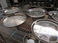 7 stainless steel round trays.