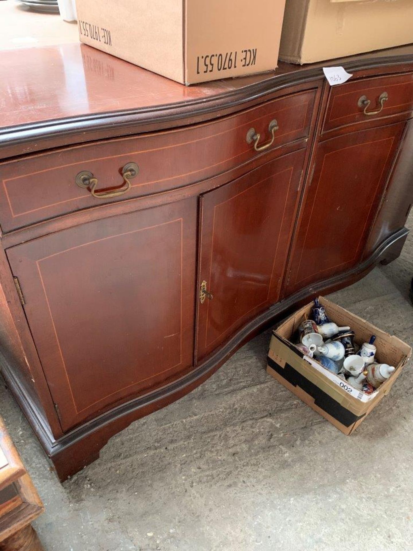 Mahogany serpentine fronted sideboard with two frieze drawers over two cupboards, 142 x 46 x 78cms. - Image 2 of 2