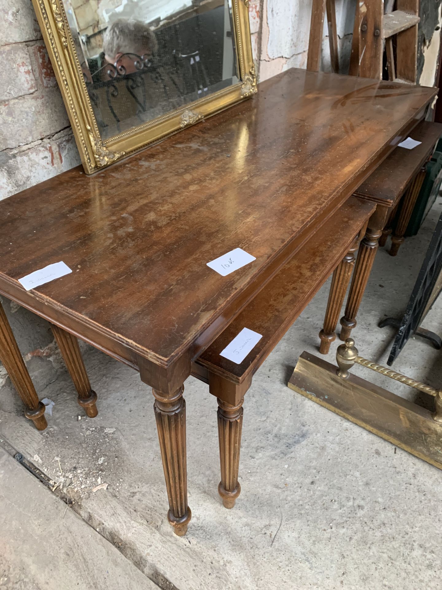 Mahogany coffee table 122 x 46 x 51cms with 2 matching under tables, 53 x 43 x 43cms.