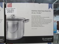 Stainless steel deep stock pot with lid.