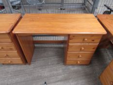 Pine wooden desk with four drawers, 105 x 73 x 49cms.