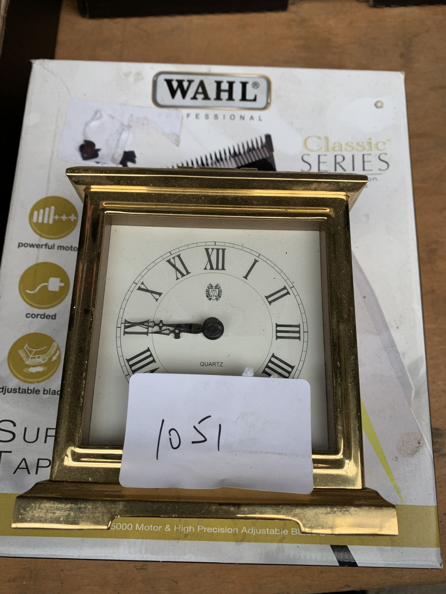 Quartz carriage clock together with WAHL corded clippers.