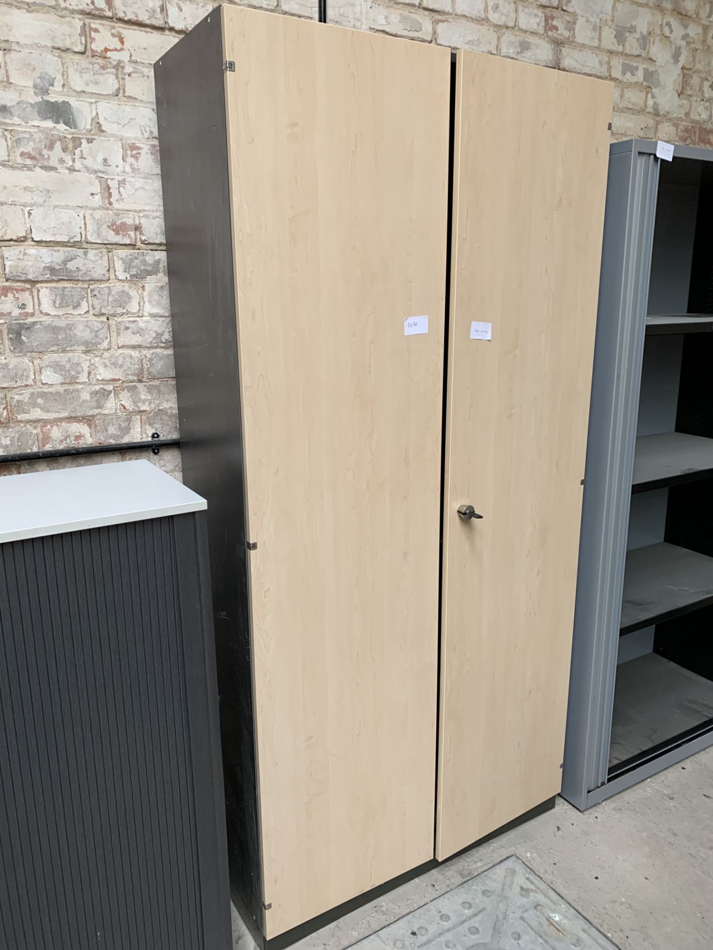 Tall office cabinet with interior shelves and key, 100 x 43 x 207cms.