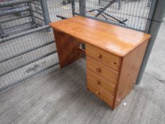 Pine wooden desk with four drawers, 105 x 73 x 49cms.