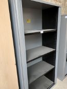 Metal tambour fronted cabinet, with interior shelves. 100 x 47 x 195cms.