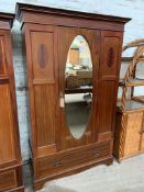 Edwardian mahogany wardrobe with oval door mirror & drawer to base, 116 x 45 x 204cms.