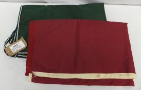 Two driving aprons - 1 burgundy with cream piping and 1 green with white piping