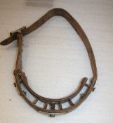 Rare crib strap with sprung spikes