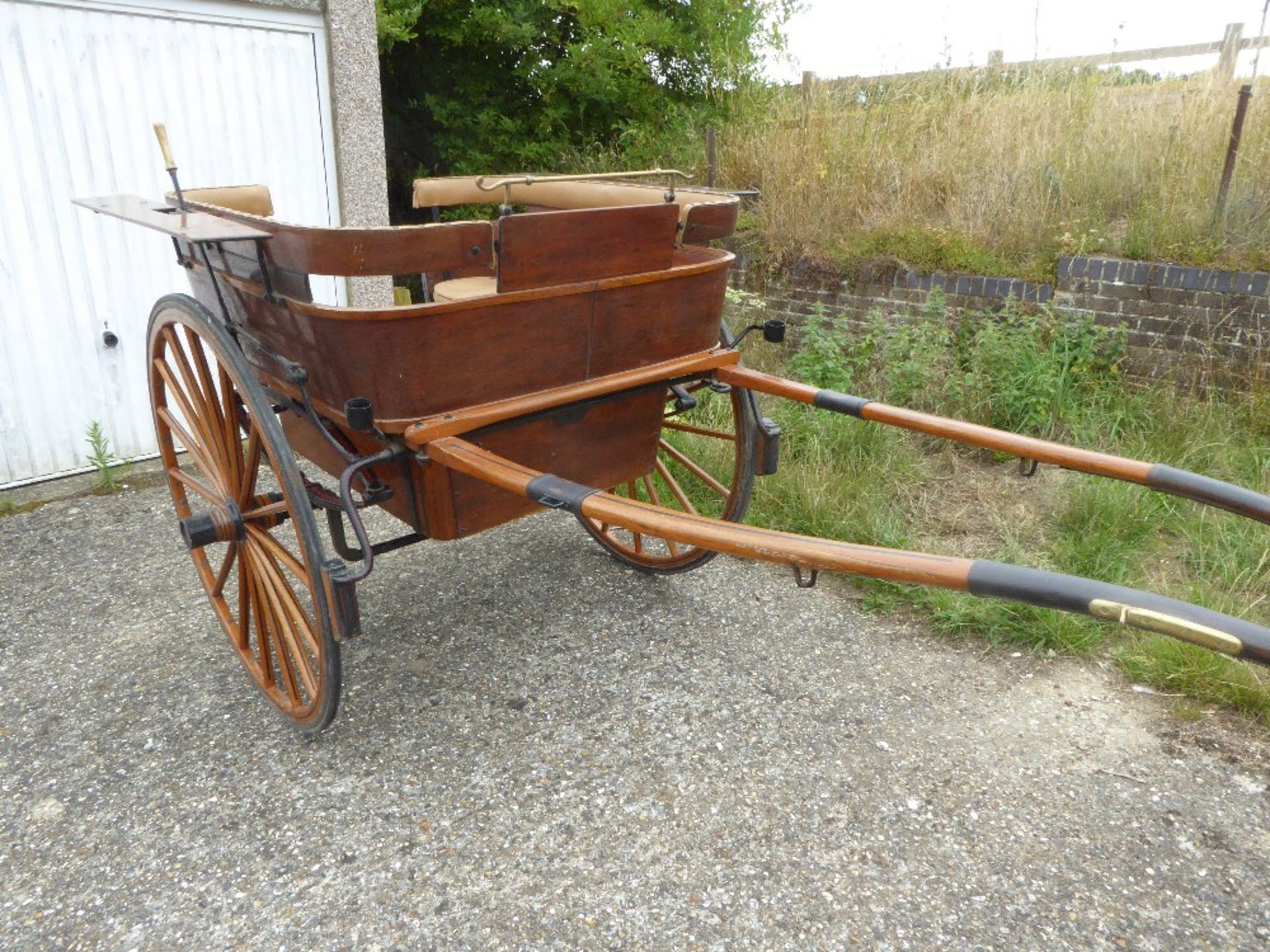 GOVERNESS CART built by McNaught & Co., of London & Worcester, to suit 13 to 14hh. On 24ins wheels