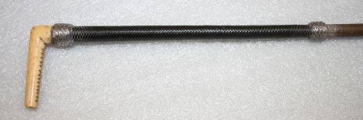 Side saddle whip with bone handle and baleen handpart