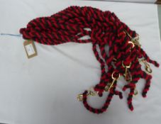 Quantity of black/red lead ropes with brass clips - carries VAT